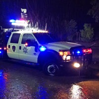 vehicle in a rainstorm at night