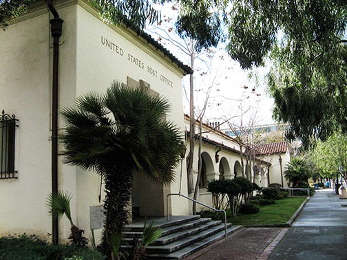 Image of historic post office building at 380 Hamilton Avenue featuring front archways