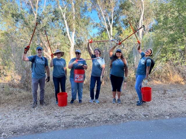 Volunteers at a trash cleanup event.