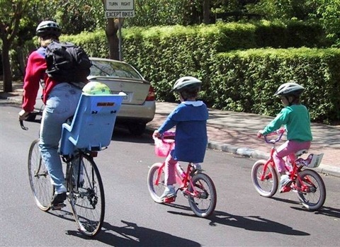 Mother baby 2 girls biking.jpg